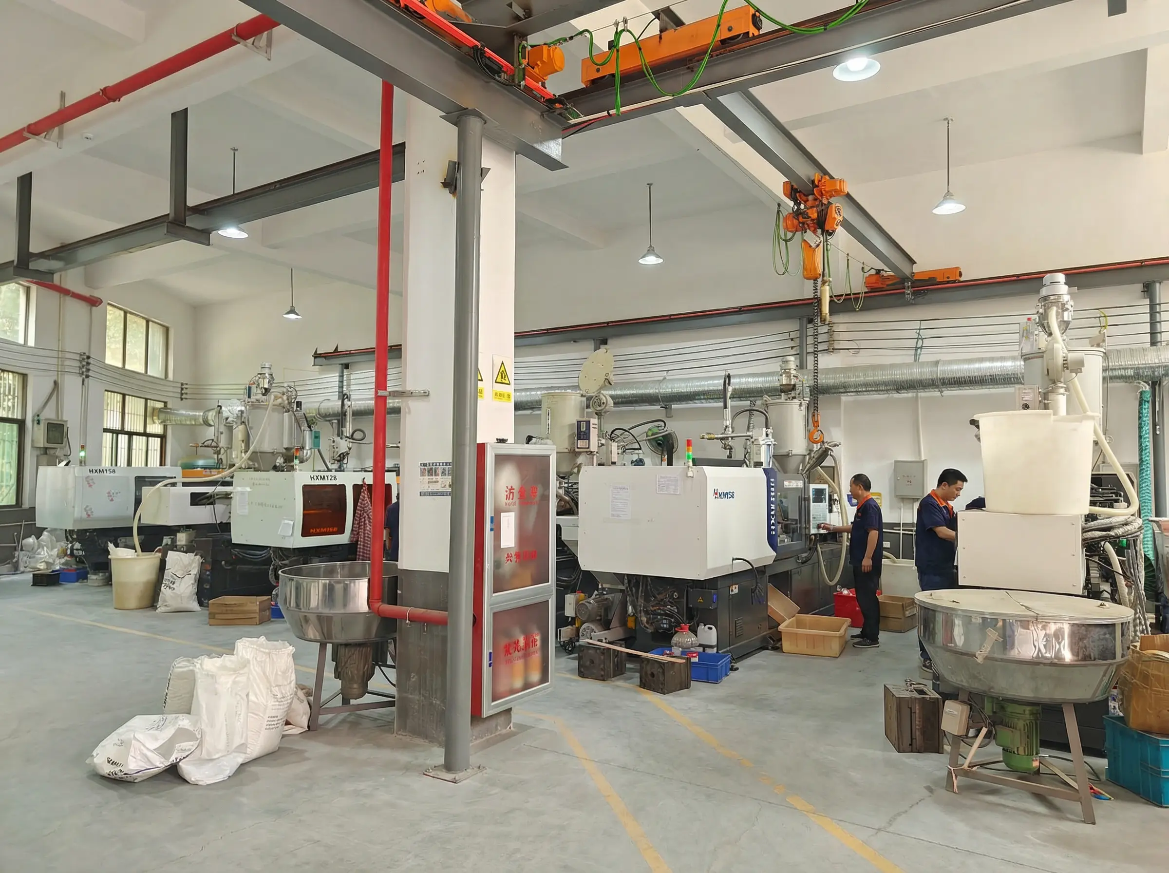 Injection molding workshop with advanced machinery for plastic party supplies manufacturing