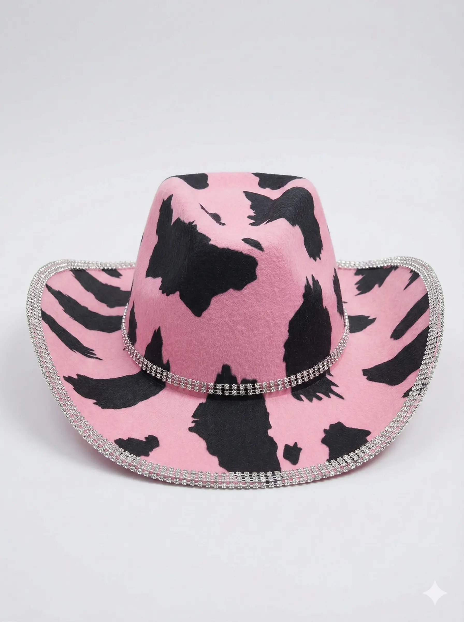 Pink Cow Print Western Hat with Rhinestone trim, cute fuzzy party hat for bachelorette parties.